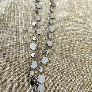 Statement piece! 
Lia Sophia long silver necklace